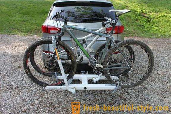 Como instalar o suporte de bicicletas no engate de reboque